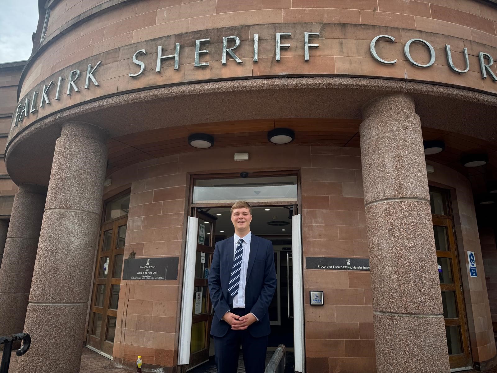 Intern James Calder outside Falkirk Sheriff Court